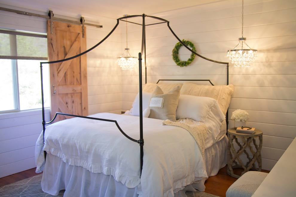 White Farmhouse Bedroom with Sliding Barn Door