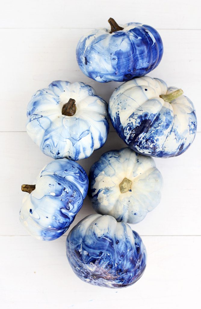 These indigo marbled pumpkins are a fun DIY project to glam up your fall decor.